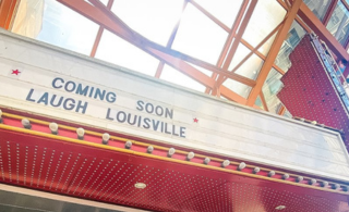 Sign saying "Coming Soon- Laugh Louisville"